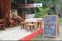 Burger Rancho Sign With Two Ladies Talking
 - Costa Rica