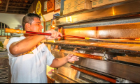 Pizza Mail It Putting The Dough In The Oven
 - Costa Rica