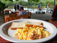 Scramble Eggs With Ham And Toast At Perla Del Sur Restaurant
 - Costa Rica