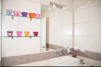 Bathroom sink with wall mirror in the apartment - Costa Rica