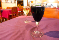 a glass of red wine 
 - Costa Rica