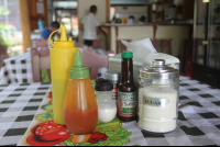 table condiments rosis soda tica 
 - Costa Rica