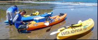 waves and caves tour three kayaks 
 - Costa Rica